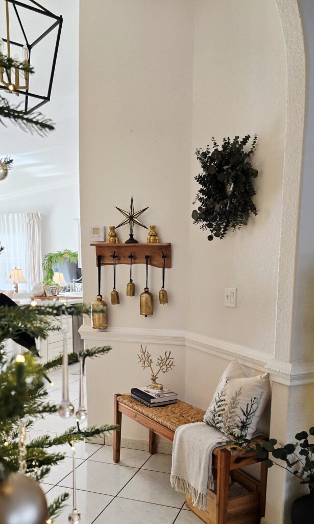 Archway with bells and a bench