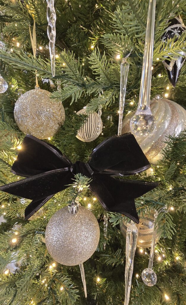 Christmas bow and icicle closeup shot