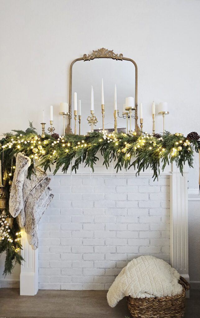 elegant mantel with brass candle holders and icicles